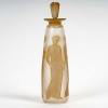 Flacon « Ambre Antique » verre blanc patiné sépia de René LALIQUE pour Coty | Biron Flacon "Ambre Antique" verre blanc patiné sépia de René LALIQUE pour Coty