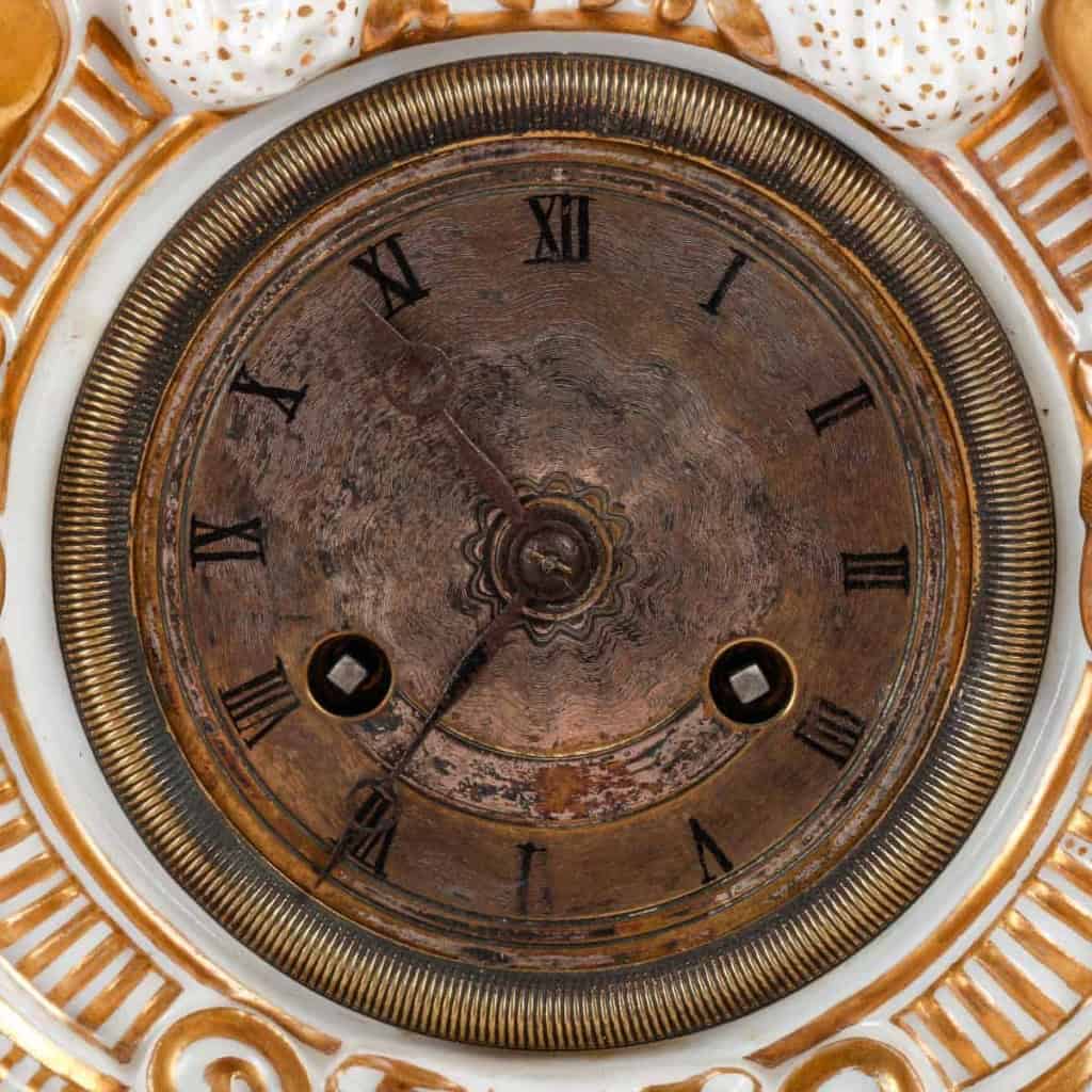 Pendule en porcelaine du XIXème siècle | Biron Pendule en porcelaine du XIXème siècle