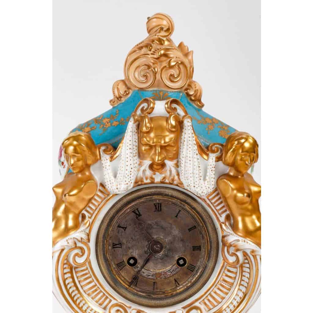 Pendule en porcelaine du XIXème siècle | Biron Pendule en porcelaine du XIXème siècle