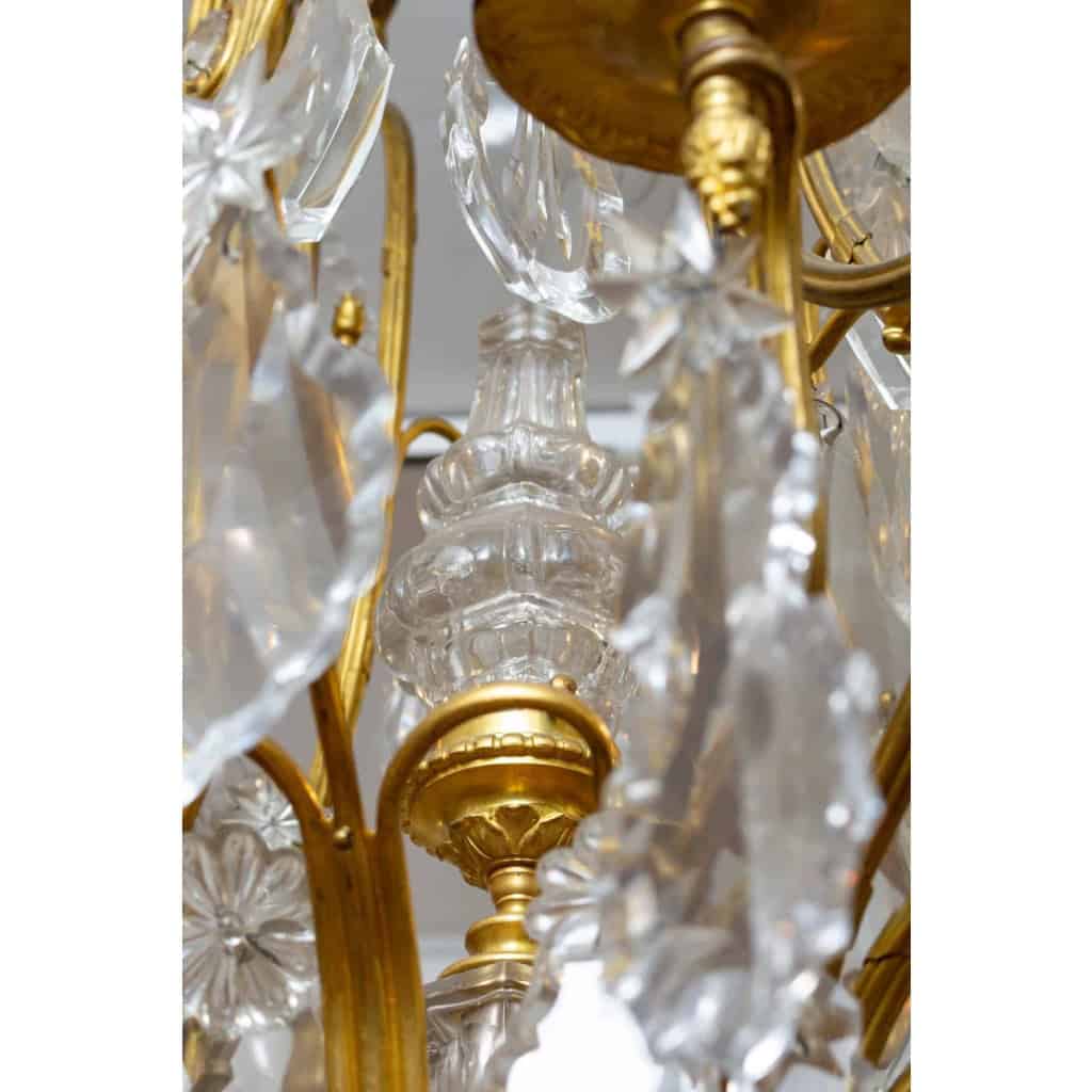 Un lustre cage en bronze doré et cristal de baccarat fin XIXème siècle | Biron Un lustre cage en bronze doré et cristal de baccarat fin XIXème siècle