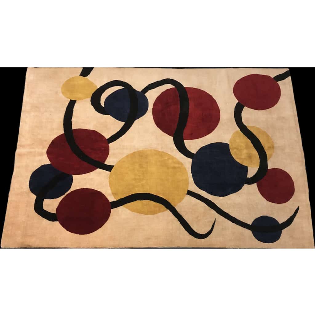 Tapis contemporain rectangulaire à décor géométrique en laine fait tissé à la main. | Biron |||||