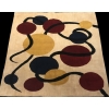Tapis contemporain rectangulaire à décor géométrique en laine fait tissé à la main. | Biron Tapis contemporain rectangulaire à décor géométrique en laine fait tissé à la main.