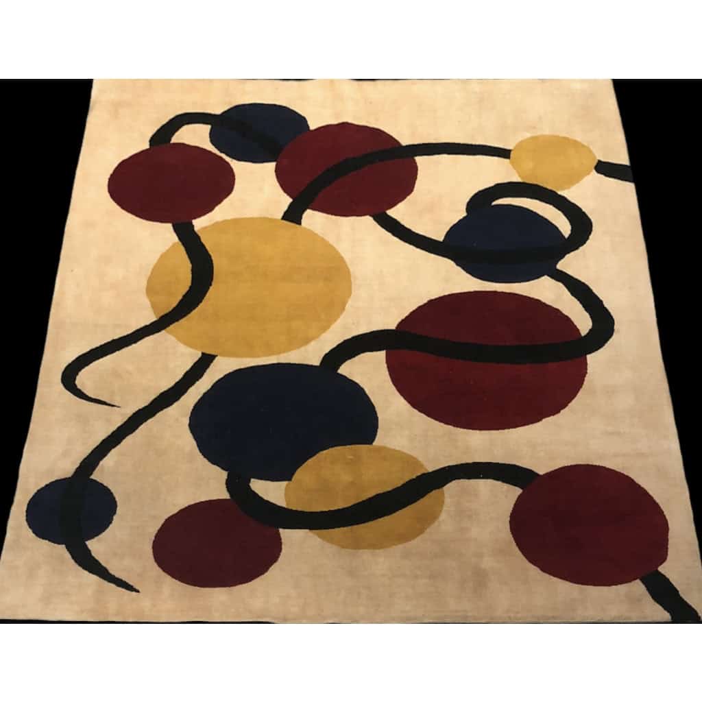 Tapis contemporain rectangulaire à décor géométrique en laine fait tissé à la main. | Biron Tapis contemporain rectangulaire à décor géométrique en laine fait tissé à la main.