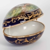Un coffret à. bijoux en porcelaine en forme d’un oeuf fin XIXème siècle | Biron Un coffret à. bijoux en porcelaine en forme d'un oeuf fin XIXème siècle