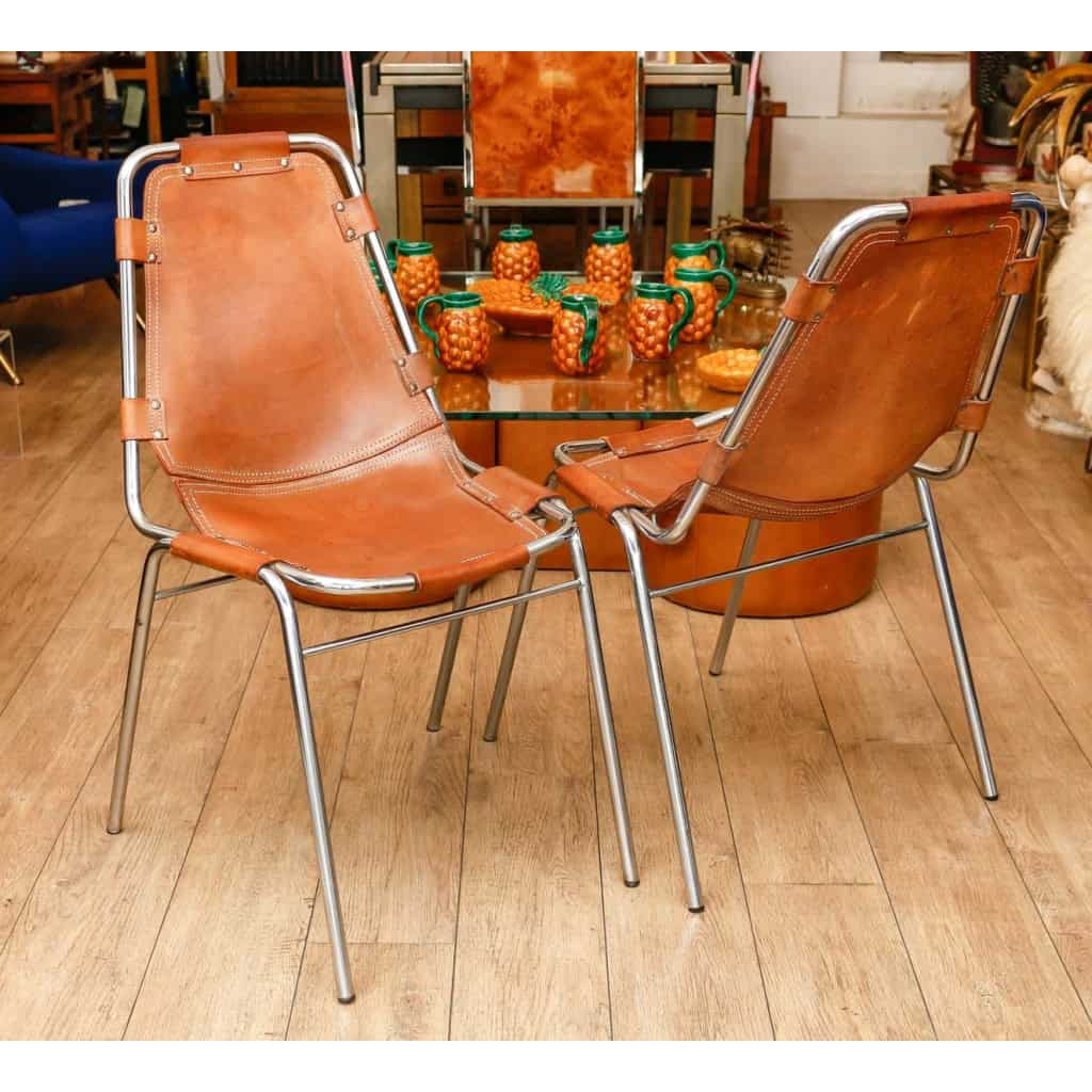4 chaises en cuir et acier chromé de Charlotte Perriand, « Les arcs », 1970-1980 | Biron 4 chaises en cuir et acier chromé de Charlotte Perriand, "Les arcs", 1970-1980