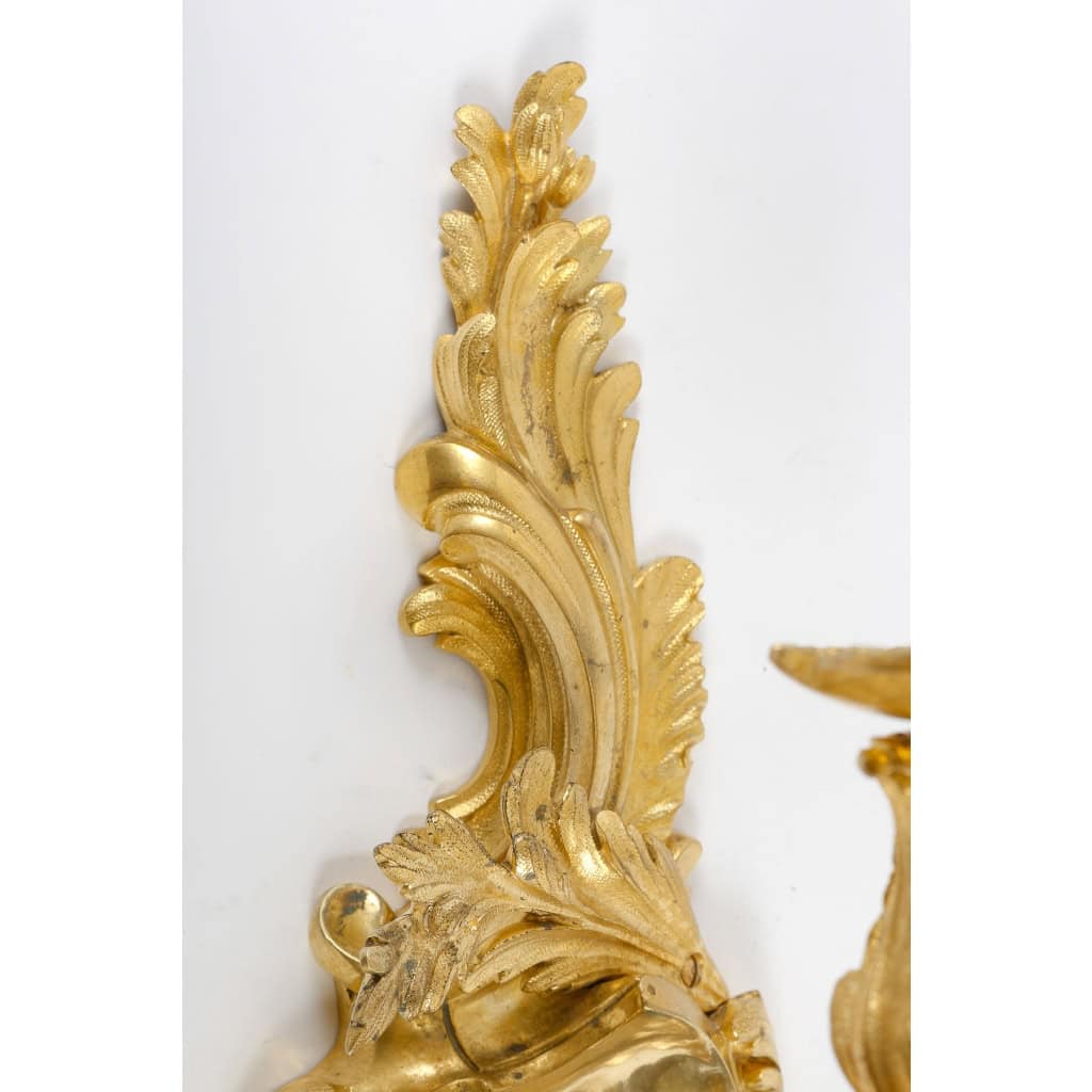 Importante paire d’appliques en bronze doré, finement ciselé, style Louis XV Rocaille, circa 1880 | Biron Importante paire d'appliques en bronze doré, finement ciselé, style Louis XV Rocaille, circa 1880
