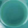 Vase « Aras » verre vert jade multicouches patiné gris de René LALIQUE | Biron Vase "Aras" verre vert jade multicouches patiné gris de René LALIQUE