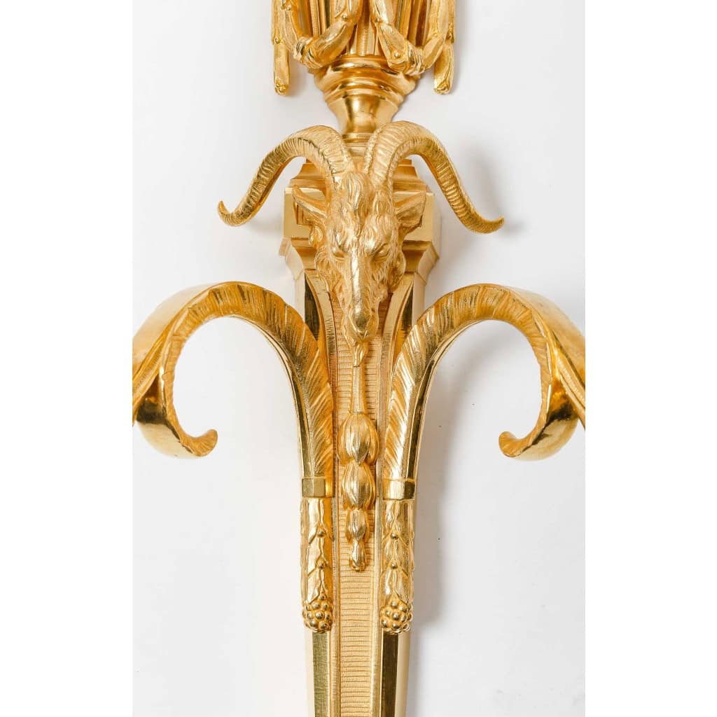 Suite de sept appliques de style Louis XVI. | Biron Suite de sept appliques de style Louis XVI.