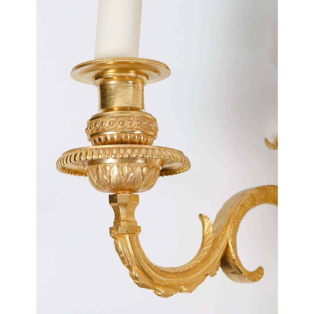 Suite de sept appliques de style Louis XVI. | Biron Suite de sept appliques de style Louis XVI.
