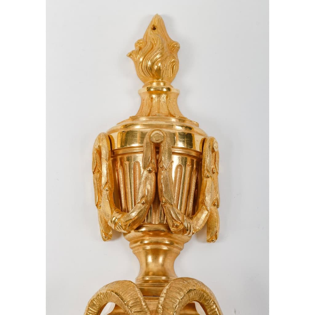 Suite de sept appliques de style Louis XVI. | Biron Suite de sept appliques de style Louis XVI.