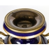 Paire de vases en porcelaine de Sèvres, Monture en bronze doré et ciselé, XIXème siècle | Biron Paire de vases en porcelaine de Sèvres, Monture en bronze doré et ciselé, XIXème siècle