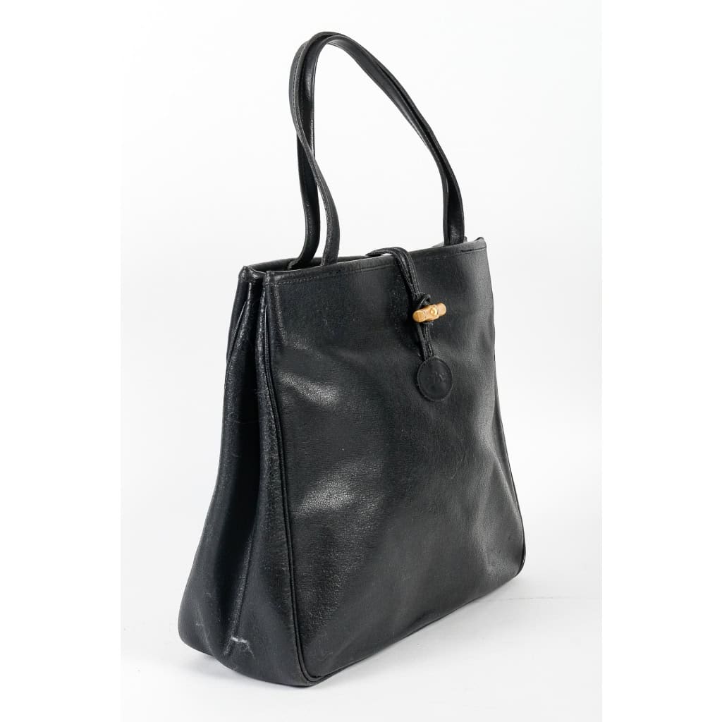 Sac à Main Vintage, Longchamp, Cuir Noir, XXème siècle. | Biron Sac à Main Vintage, Longchamp, Cuir Noir, XXème siècle.