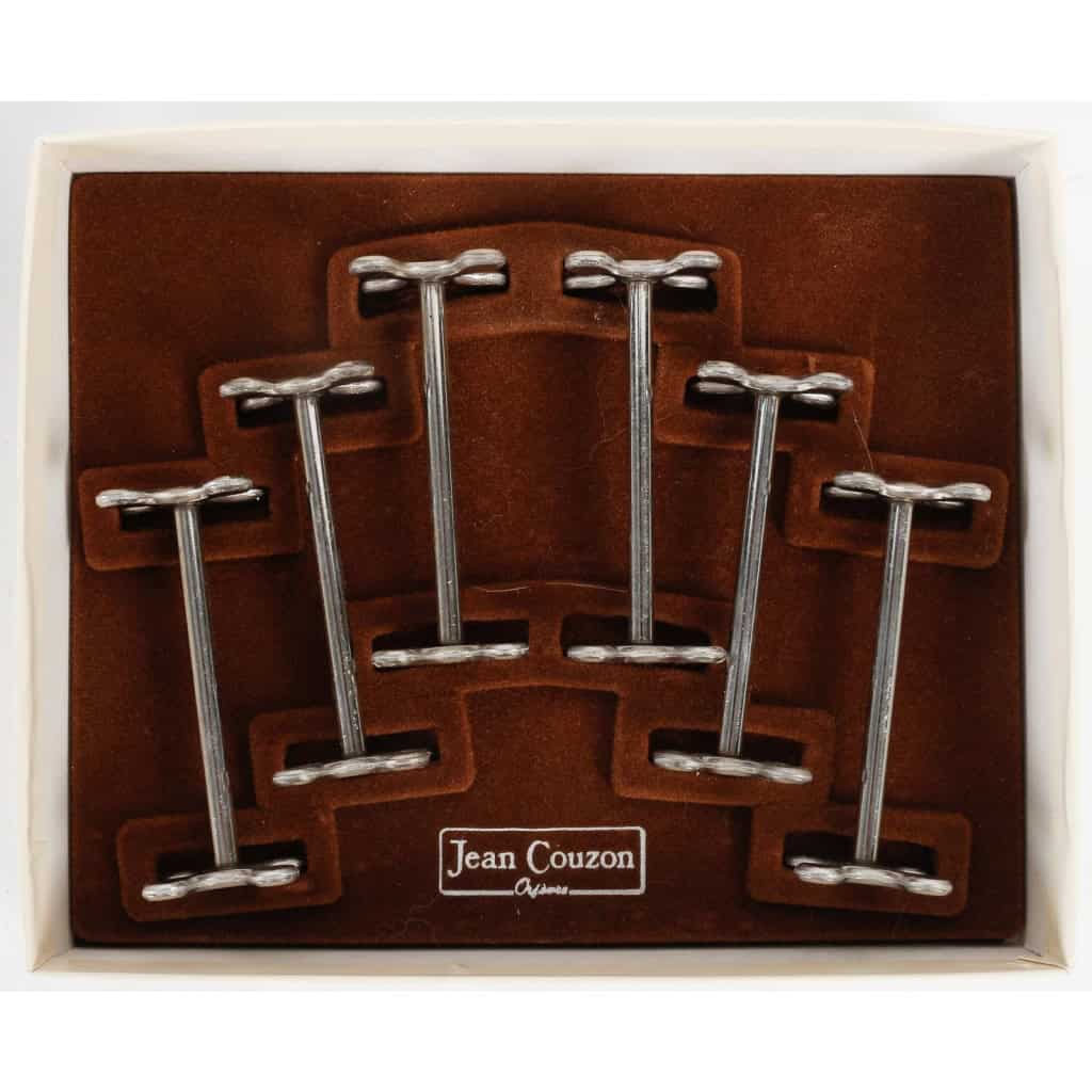 Série de 6 porte-couteaux en métal argenté de la maison Jean Couzon. 1980 | Biron Série de 6 porte-couteaux en métal argenté de la maison Jean Couzon. 1980
