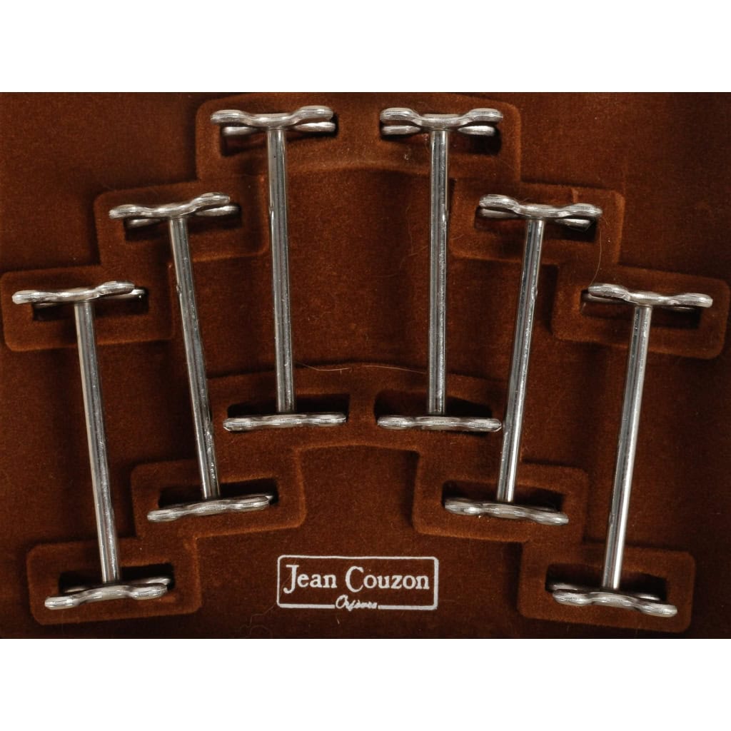 Série de 6 porte-couteaux en métal argenté de la maison Jean Couzon. 1980 | Biron Série de 6 porte-couteaux en métal argenté de la maison Jean Couzon. 1980