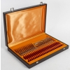 Service à poissons de 12 couverts en bacolite et inox de la maison Guy Degrenne orfèvre, 1980 | Biron |||||||