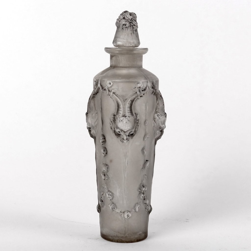 Flacon « Pan » verre blanc patiné gris de René LALIQUE | Biron |||||