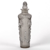 Flacon « Pan » verre blanc patiné gris de René LALIQUE | Biron Flacon "Pan" verre blanc patiné gris de René LALIQUE