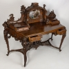 Spectaculaire bureau à gradins en noyer, avec peinture signée P. Soulet et daté de 1896 | Biron Spectaculaire bureau à gradins en noyer, avec peinture signée P. Soulet et daté de 1896
