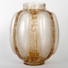 Vase « Six Figurines et Masques » verre blanc patiné sépia de René LALIQUE | Biron Vase "Six Figurines et Masques" verre blanc patiné sépia de René LALIQUE