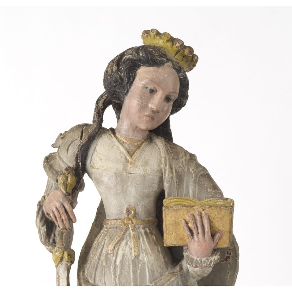 Sainte Catherine d’Alexandrie, Sculpture polychrome et dorée. France milieu XVIe siècle. | Biron Sainte Catherine d’Alexandrie, Sculpture polychrome et dorée. France milieu XVIe siècle.