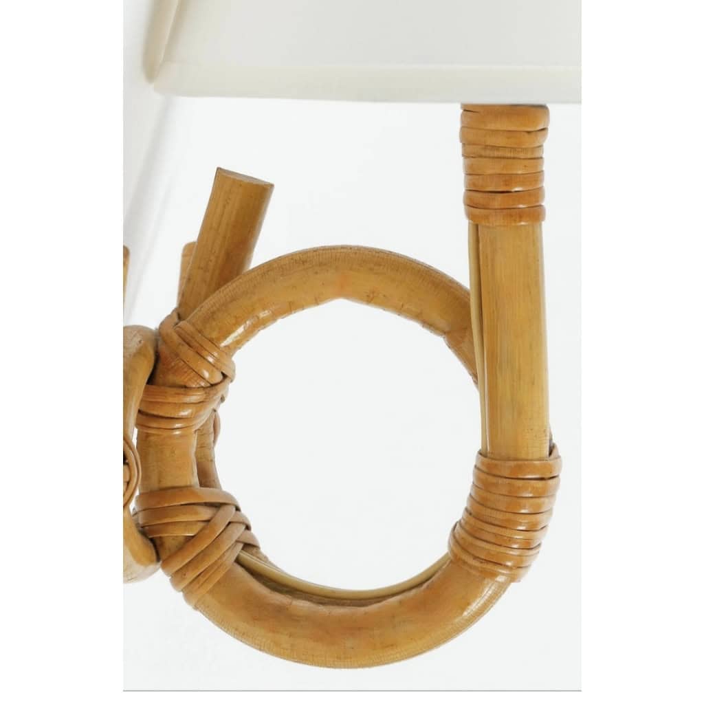 1950 Paire d’appliques en rotin par Louis Sognot | Biron 1950 Paire d'appliques en rotin par Louis Sognot