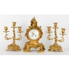 Une garniture en bronze doré de style louis XV fin XIXème siècle | Biron Une garniture en bronze doré de style louis XV fin XIXème siècle
