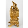 Une garniture en bronze doré de style louis XV fin XIXème siècle | Biron Une garniture en bronze doré de style louis XV fin XIXème siècle