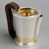 Service Thé et Café Moderniste argent, vermeil et palissandre de Jean E. Puiforcat | Biron Service Thé et Café Moderniste argent, vermeil et palissandre de Jean E. Puiforcat
