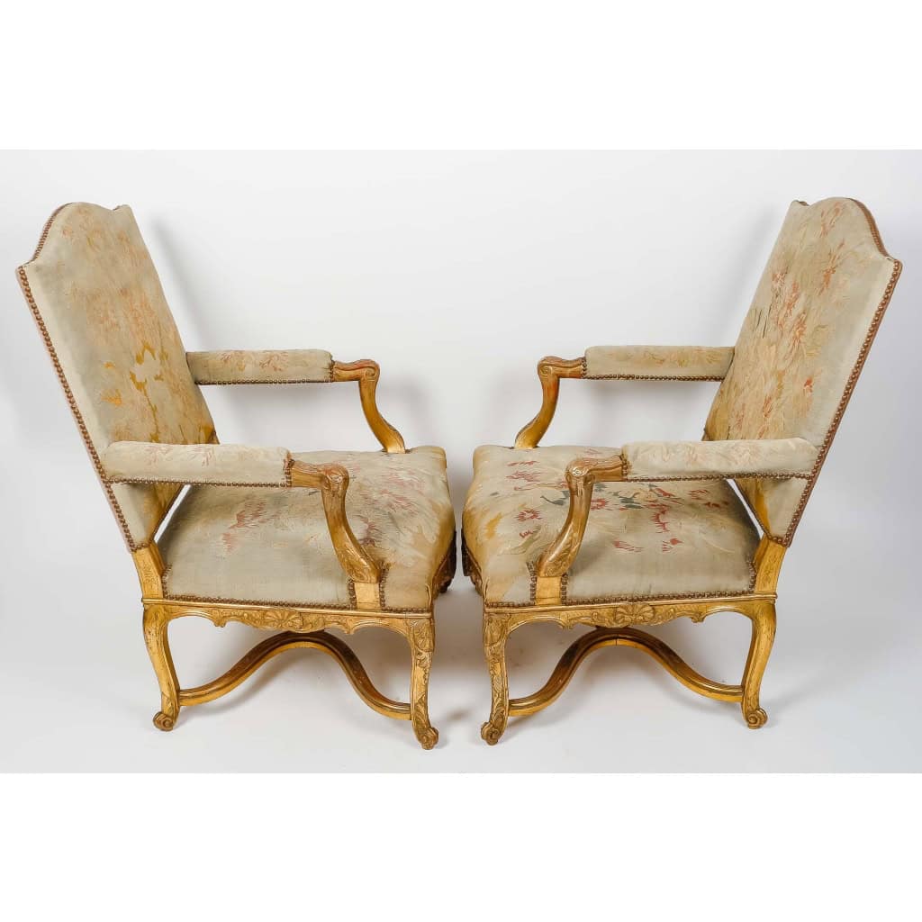 Une paire de fauteuils de style régence en bois doré fin XIXème siècle | Biron Une paire de fauteuils de style régence en bois doré fin XIXème siècle