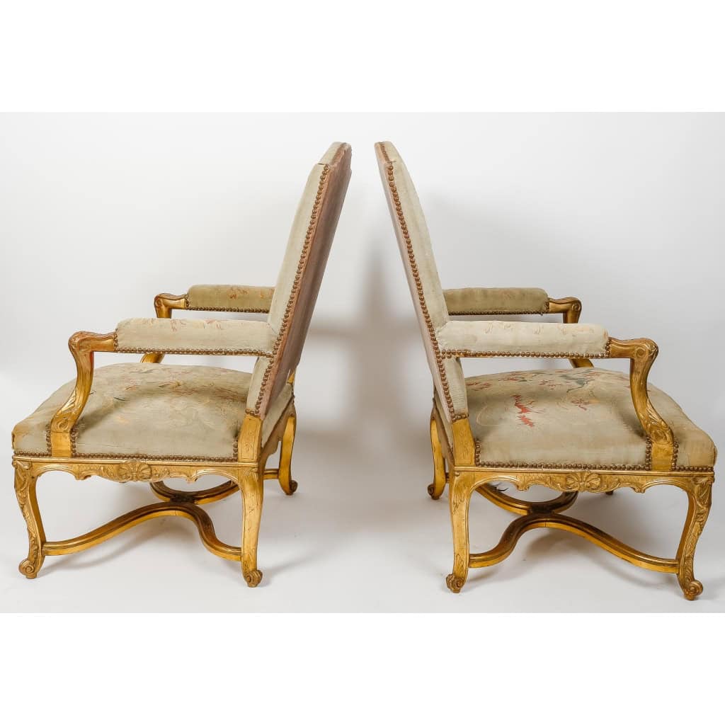 Une paire de fauteuils de style régence en bois doré fin XIXème siècle | Biron Une paire de fauteuils de style régence en bois doré fin XIXème siècle