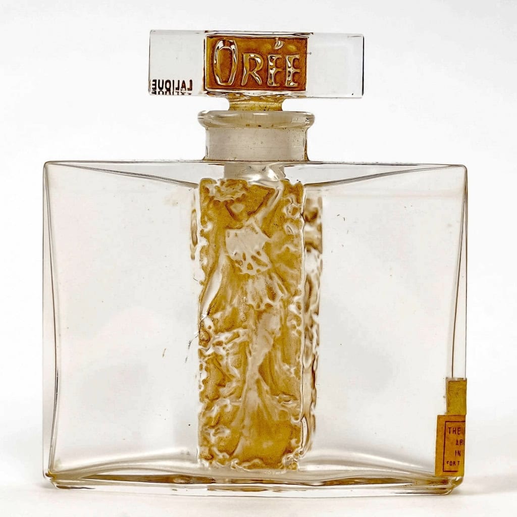 Flacon « L’Orée » verre blanc patiné sépia de René LALIQUE pour Claire Paris | Biron Flacon "L'Orée" verre blanc patiné sépia de René LALIQUE pour Claire Paris