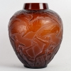 Vase « Archers » verre rouge ambré patiné blanc de René LALIQUE | Biron ||||||