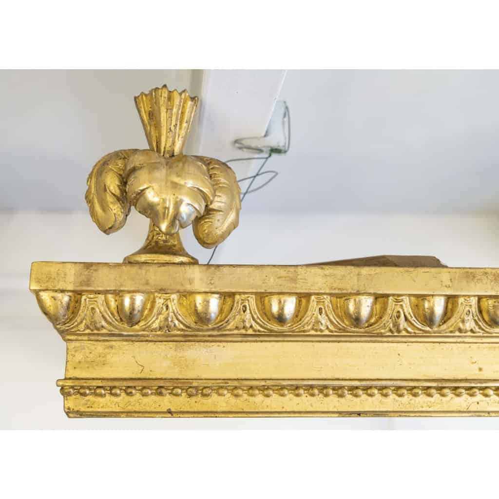 Paire de cantonnières en bois doré. | Biron Paire de cantonnières en bois doré.