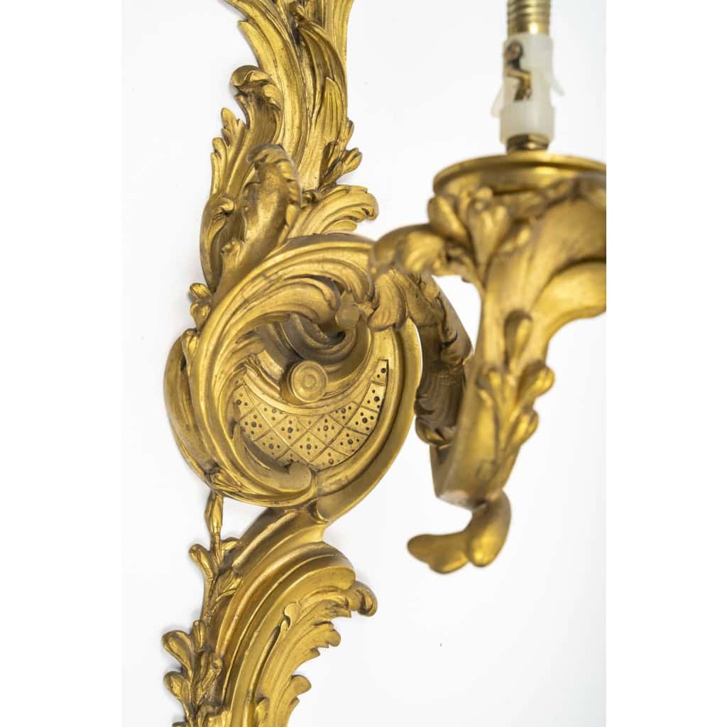 Paire d’appliques bronze style Régence | Biron Paire d’appliques bronze style Régence