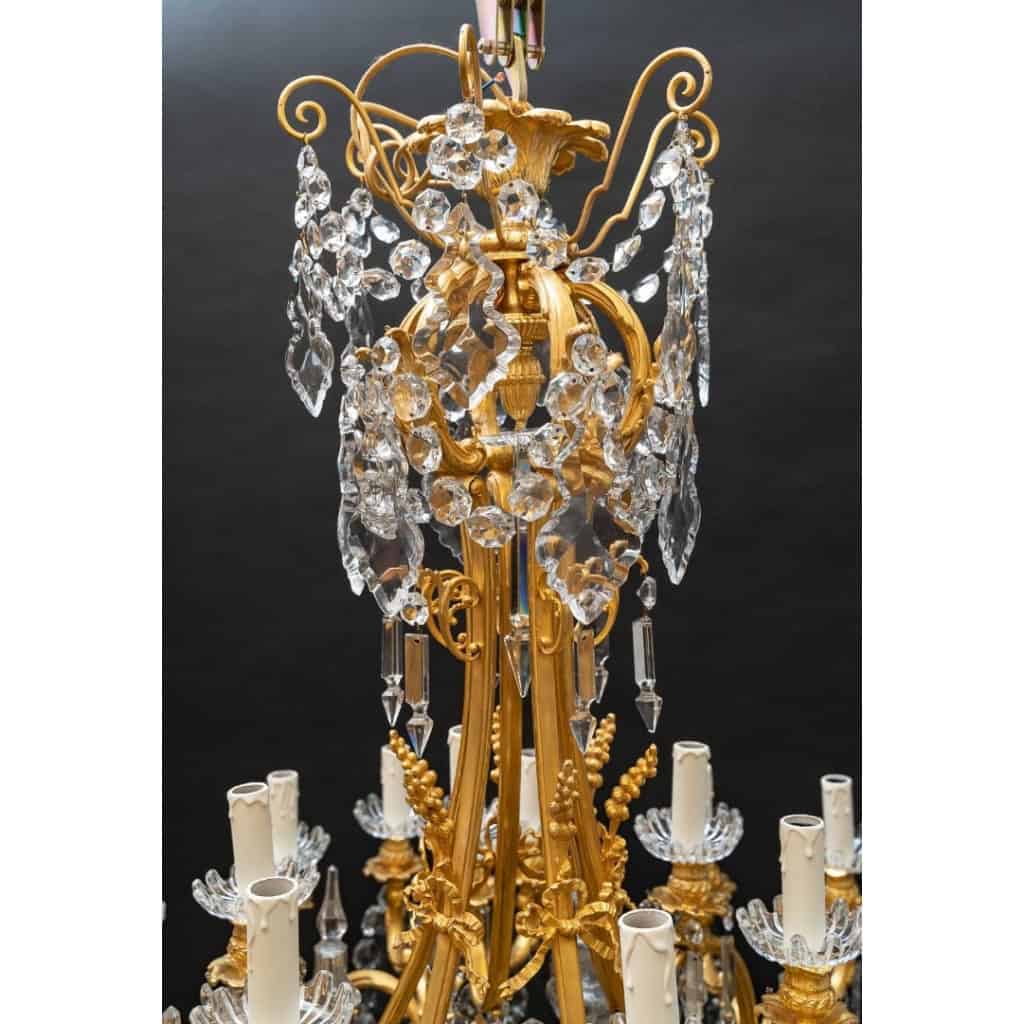 Important lustre en bronze doré et cristaux