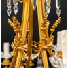 Important lustre en bronze doré et cristaux
