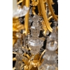 Important lustre en bronze doré et cristaux