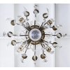 Lustre en bronze et cristal à 12 bras de Lumière | Biron Lustre en bronze et cristal à 12 bras de Lumière