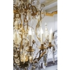 Lustre en bronze et cristal à 12 bras de Lumière | Biron Lustre en bronze et cristal à 12 bras de Lumière