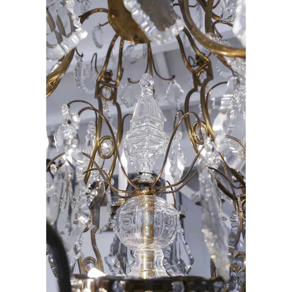 Lustre en bronze et cristal à 12 bras de Lumière | Biron Lustre en bronze et cristal à 12 bras de Lumière