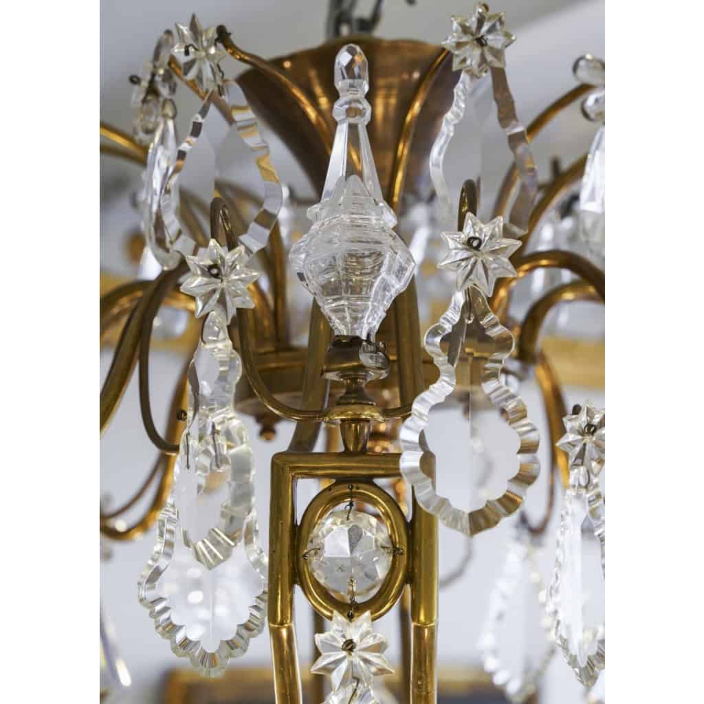 Lustre en bronze et cristal à 12 bras de Lumière | Biron Lustre en bronze et cristal à 12 bras de Lumière