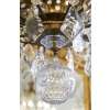 Lustre en bronze et cristal à 12 bras de Lumière | Biron Lustre en bronze et cristal à 12 bras de Lumière