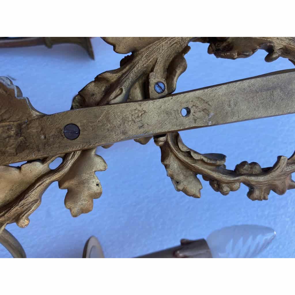 1900′ Paire d’Appliques Style Louis 16 Bronze Doré Aux Cors De Chasse Signée Jansen | Biron 1900′ Paire d’Appliques Style Louis 16 Bronze Doré Aux Cors De Chasse Signée Jansen
