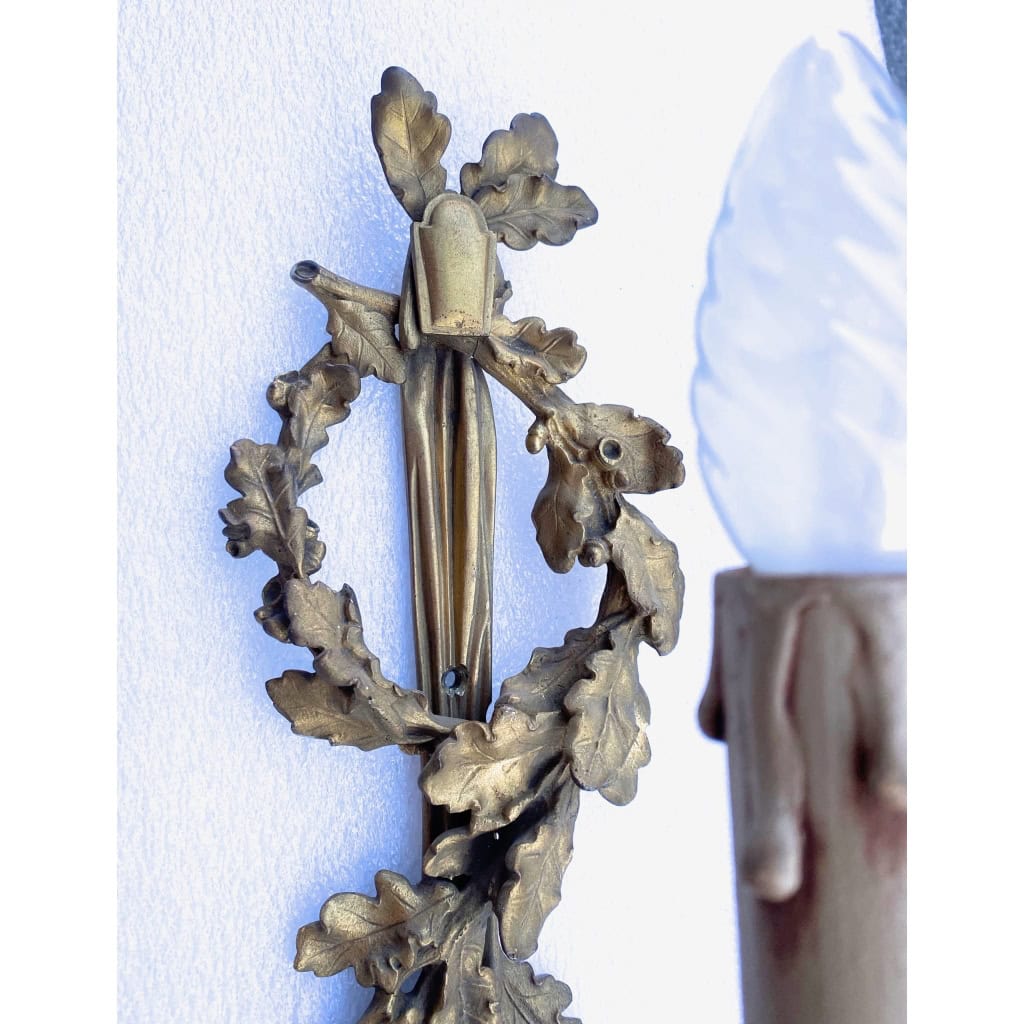 1900′ Paire d’Appliques Style Louis 16 Bronze Doré Aux Cors De Chasse Signée Jansen | Biron 1900′ Paire d’Appliques Style Louis 16 Bronze Doré Aux Cors De Chasse Signée Jansen