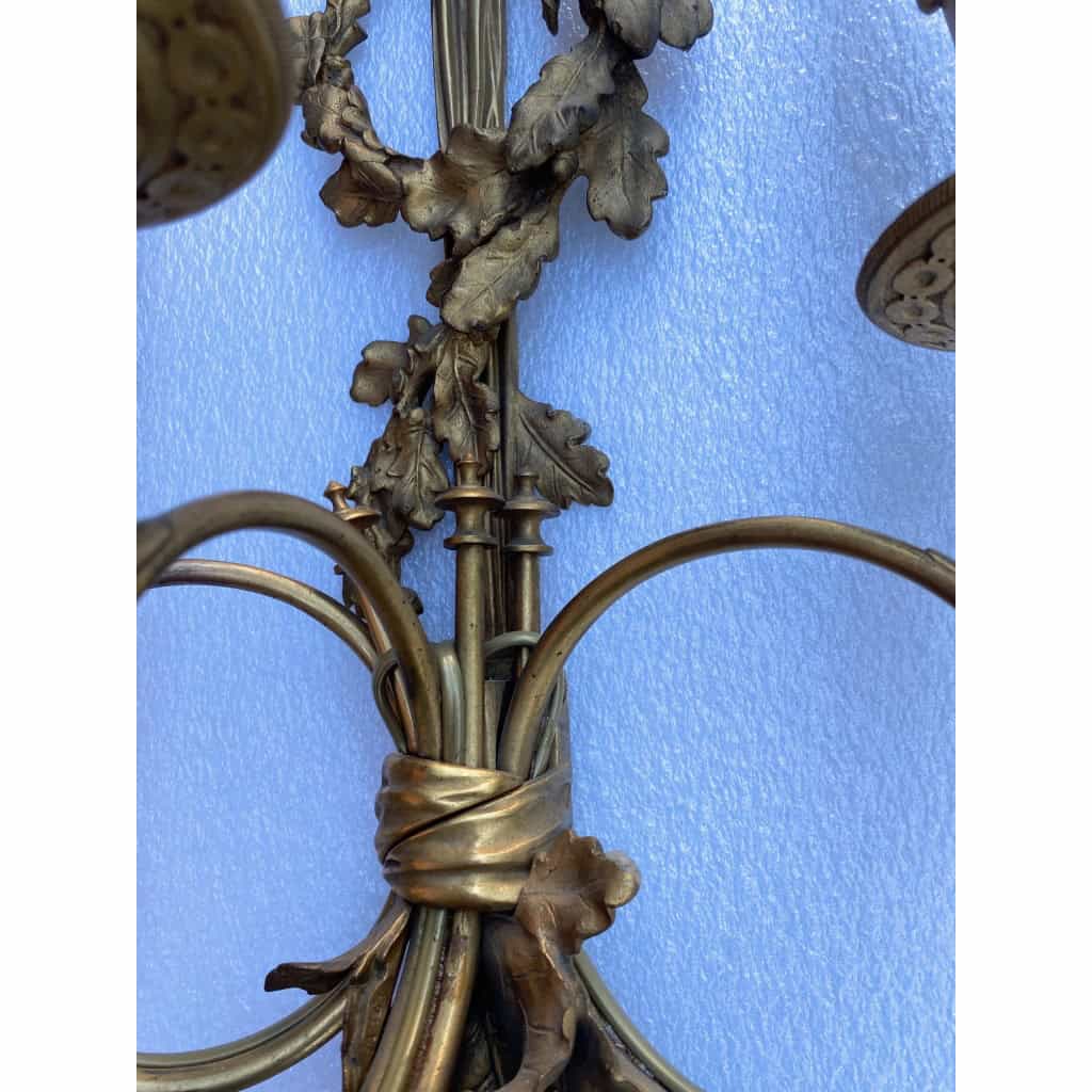 1900′ Paire d’Appliques Style Louis 16 Bronze Doré Aux Cors De Chasse Signée Jansen | Biron 1900′ Paire d’Appliques Style Louis 16 Bronze Doré Aux Cors De Chasse Signée Jansen