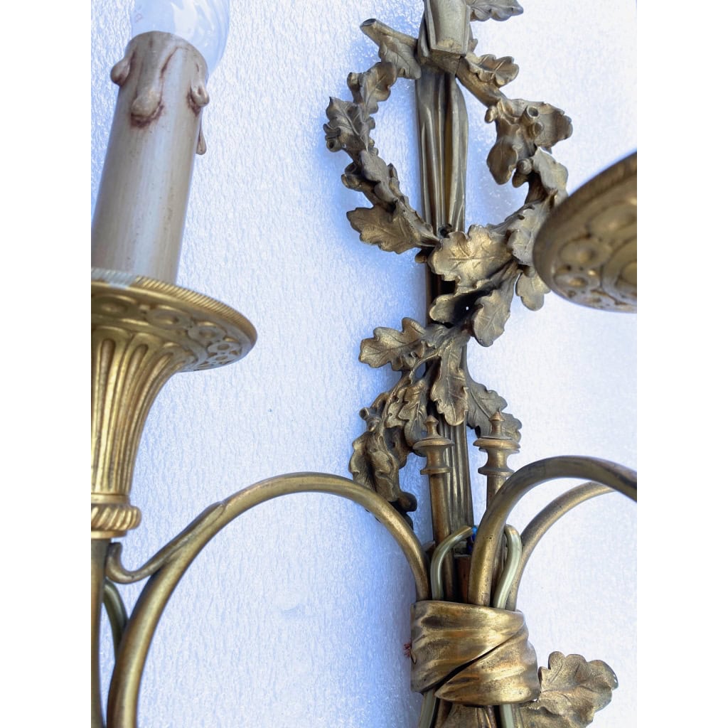 1900′ Paire d’Appliques Style Louis 16 Bronze Doré Aux Cors De Chasse Signée Jansen | Biron 1900′ Paire d’Appliques Style Louis 16 Bronze Doré Aux Cors De Chasse Signée Jansen
