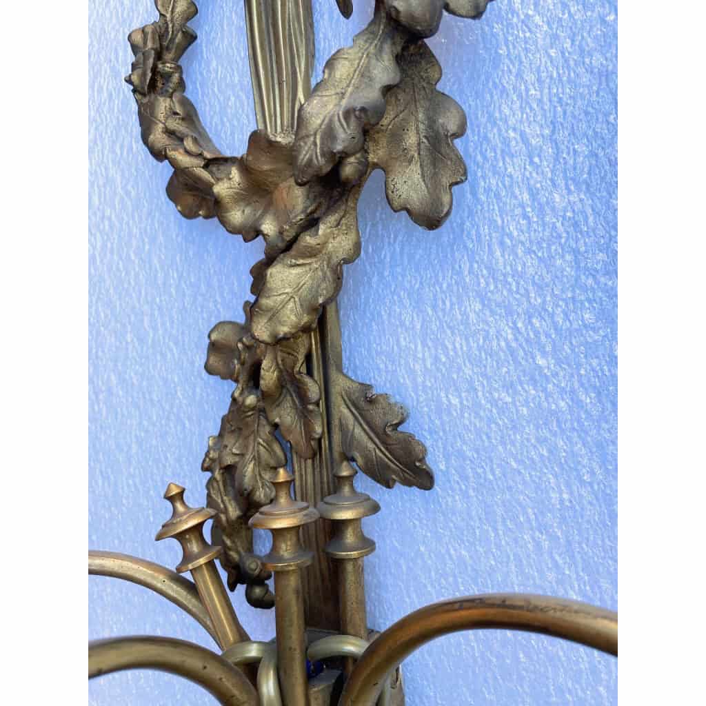 1900′ Paire d’Appliques Style Louis 16 Bronze Doré Aux Cors De Chasse Signée Jansen | Biron 1900′ Paire d’Appliques Style Louis 16 Bronze Doré Aux Cors De Chasse Signée Jansen