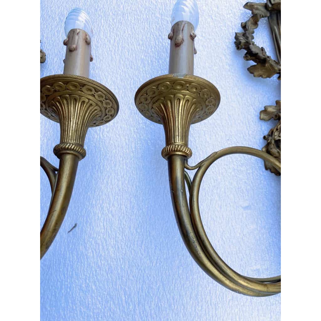 1900′ Paire d’Appliques Style Louis 16 Bronze Doré Aux Cors De Chasse Signée Jansen | Biron 1900′ Paire d’Appliques Style Louis 16 Bronze Doré Aux Cors De Chasse Signée Jansen