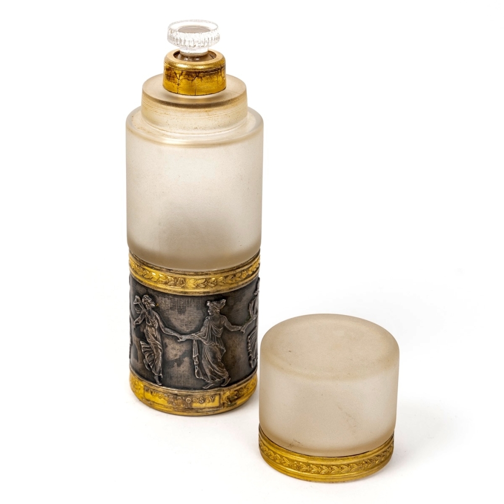 Flacon « Ambre » en cristal blanc de BACCARAT et frise en bronze à décor de femmes de René LALIQUE | Biron Flacon "Ambre" en cristal blanc de BACCARAT et frise en bronze à décor de femmes de René LALIQUE