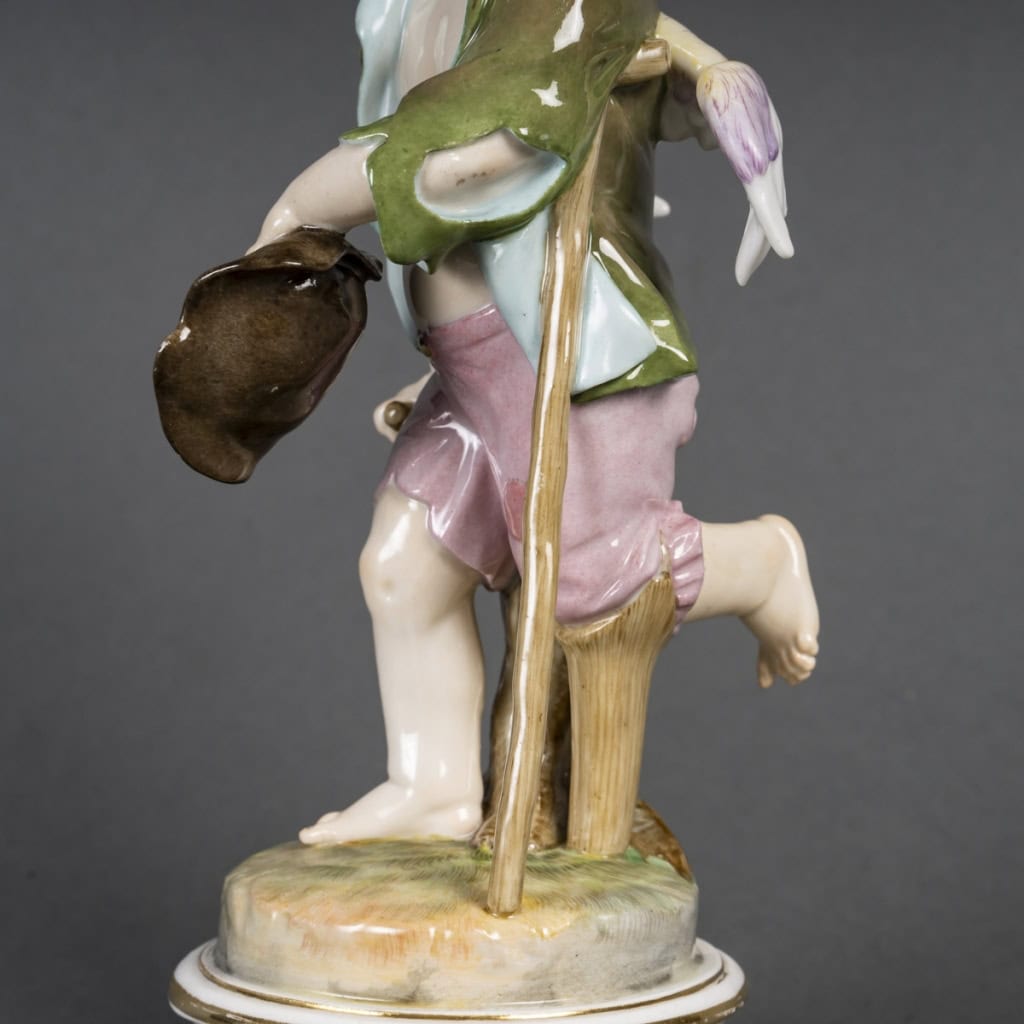 Porcelain figurine, the begging love from the Meissen manufactory, XIX1st century | Biron Porcelain figurine, the begging cupid from the Meissen factory, XIXth century